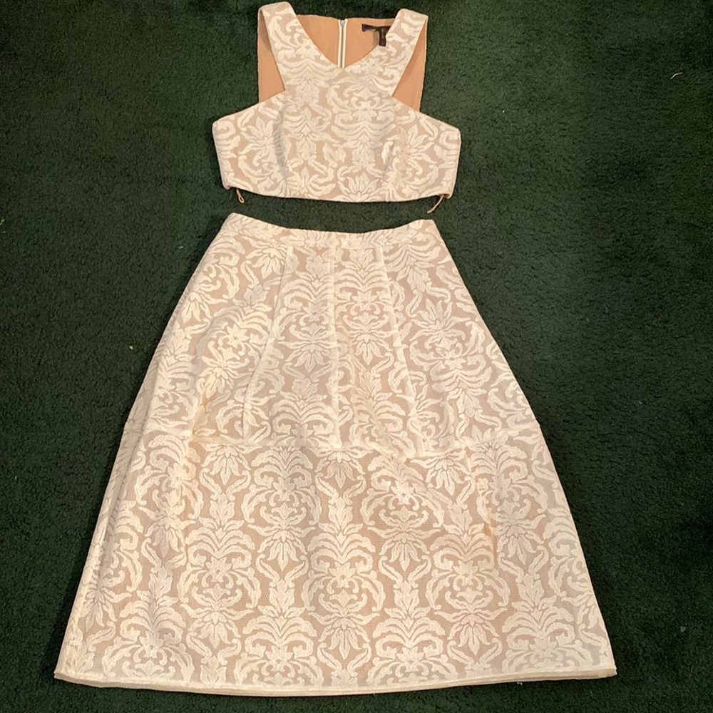 Two piece bcbg maxazria white lace crop top and a line skirt